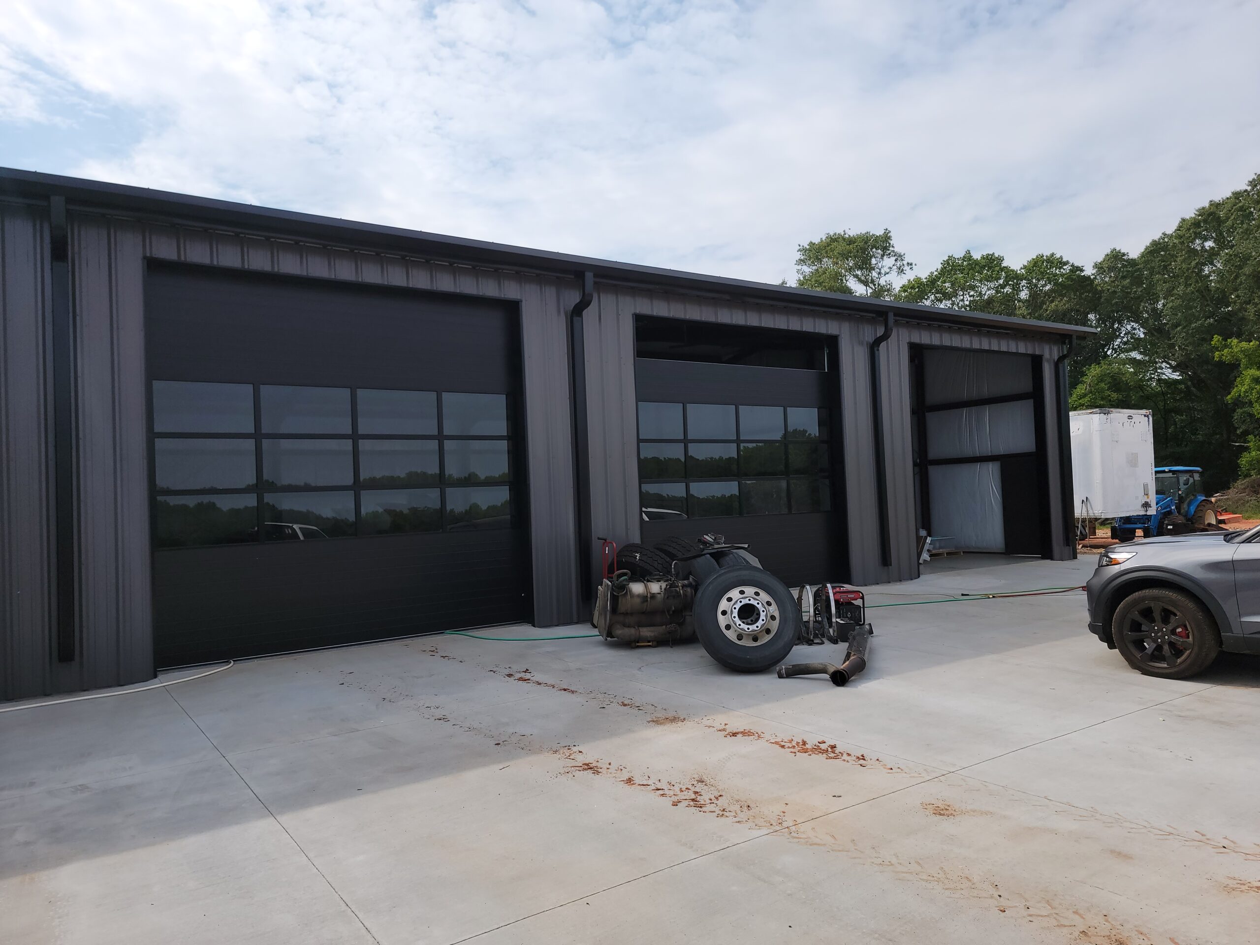 black full view garage doors with glass