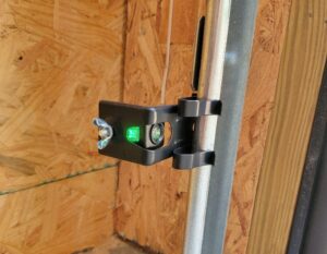 garage door safety eye receiving sensor green
